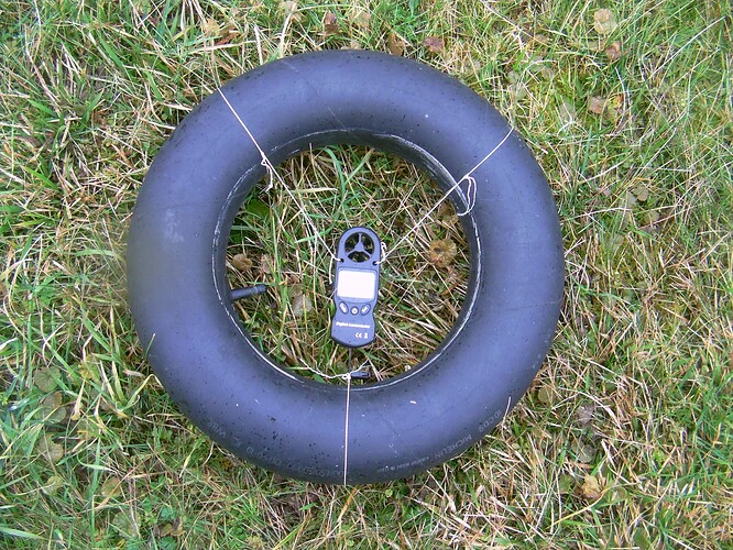 anemometer in the tire well positioned with taut wires