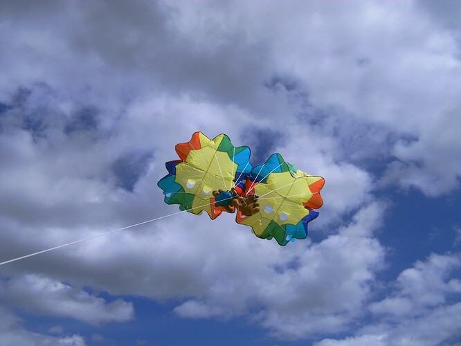 2 parachute kite cluster in flight